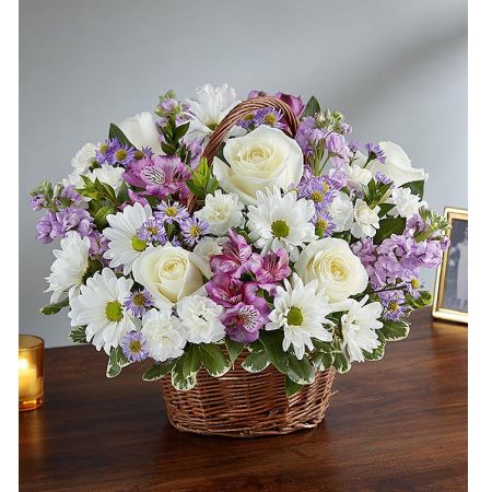 Conroy's Florist & Flower Delivery Mission Viejo - Just as lavender is said to hold a sacred place in nature, the departed will always hold a sacred place in your heart. Our lavender and white arrangement, artistically designed inside a keepsake willow basket, is a touching way to convey your love and sincerest blessings.