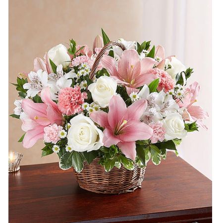 Conroy's Florist & Flower Delivery Mission Viejo - Representing care, compassion and love - pink blooms can offer solace in times of sorrow. Artistically designed inside a keepsake willow basket, our arrangement in soothing pink hues is a touching way to offer your sincerest blessings.