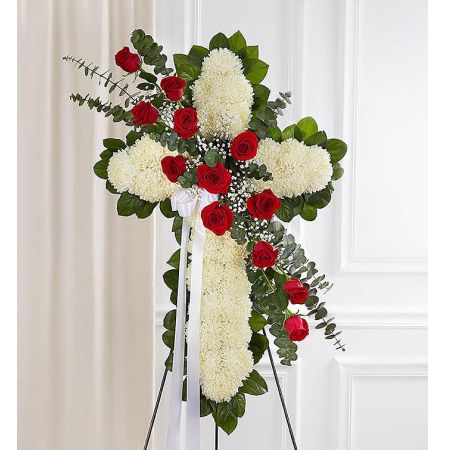 Conroy's Florist & Flower Delivery Mission Viejo - If faith was an important part of their life, our standing cross arrangement is a special way to honor a loved one’s memory. Our expert florists handcraft each of these impressive displays with a bed of white mums in the shape of a cross, and accent with a cascade of red roses and spiral eucalyptus. This floral tribute is a beautiful way for family to offer peace and comfort during a difficult time.