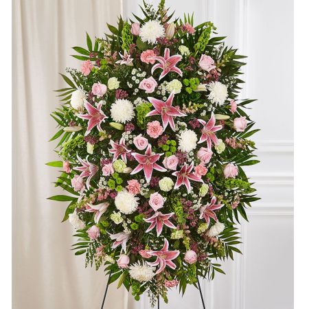 Conroy's Florist & Flower Delivery Mission Viejo - When we celebrate the life of a loved one, we honor their memory through heartfelt words and gestures. Our classic standing spray arrangement creates a graceful tribute, crafted with soft pastel blooms for a lush, full presentation. What a special way to remember someone so very loved.
