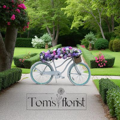 Tom's Florist Smyrna - Flower Bike Rental – Up to 4 Hours

Make your event unforgettable with our beautifully decorated Flower Bike – a one-of-a-kind statement piece overflowing with lush seasonal blooms. Perfect for weddings, photo shoots, parties, storefront displays, or community events, this charming bike adds a whimsical and eye-catching touch wherever it goes.

✨ Details:
	•	Rental includes up to 4 hours of use
	•	Fully styled with fresh seasonal flowers in your chosen color palette
	•	Ideal as a photo backdrop, décor centerpiece, or event accent

Bring instant charm and floral beauty to your special occasion with our Flower Bike – a showstopper that guests won’t stop talking about!