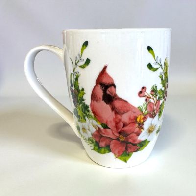 Tom's Florist Smyrna - Start your day with a touch of woodland charm using this beautifully crafted Cardinal Mug. 
Standing at approximately 5.5 inches tall, this mug features a vivid, detailed cardinal design that brings the warmth and color of nature right to your morning routine.

Features:
• Approx. 5.5" tall
• High-quality ceramic construction
• Vibrant cardinal illustration or sculpted design
• Comfortable handle for everyday use
• Great for gifts, collectors, and nature lovers