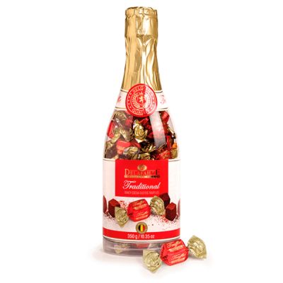 Tom's Florist Smyrna - Indulge in a sweet twist on a classic favorite! This elegant plastic wine bottle is filled with chocolate truffles, creating the perfect gift for any celebration. 

It’s a playful yet sophisticated way to say cheers with chocolate.

Each truffle offers a smooth, melt-in-your-mouth experience that pairs perfectly with any occasion—birthdays, holidays, weddings, or a well-deserved treat for yourself.