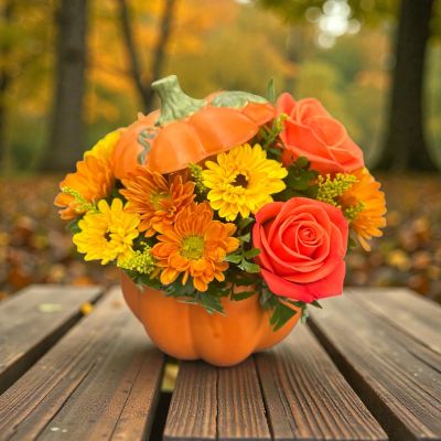 Tom's Florist Smyrna - A delightful display of seasonal charm and vibrant color. Nestled in a charming pumpkin-shaped base
Perfect for: Thanksgiving, fall birthdays, or seasonal décor.