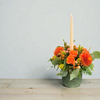 Tom's Florist Smyrna - The rich beauty of the European countryside comes alive in our best-selling fall centerpiece. Crafted by our designers, it’s filled with a gathering of fresh-picked blooms in brilliant colors and finished with to warm hearts and homes. 