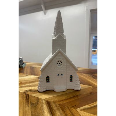 Tom's Florist Smyrna - This exquisite 16" white ceramic church is a beautiful and meaningful sympathy gift, offering comfort and solace during times of remembrance. Featuring stunning stained glass windows that softly light up and a built-in music box that plays Amazing Grace, this piece creates a peaceful, serene atmosphere, making it a thoughtful way to honor the memory of a loved one. A lasting keepsake, it brings both light and melody to help provide peace during moments of grief.

Key Features:

- Height: 16 inches tall, a graceful and comforting centerpiece for any space.

- Stained Glass Windows: The intricate stained glass details glow softly, filling the room with a warm, peaceful light.

- Music Box: Plays the timeless hymn Amazing Grace, offering an emotional and soothing melody.

- Ceramic Craftsmanship: Made from high-quality ceramic with delicate detailing, adding a sophisticated and timeless touch.

- Plug-In Design: Features a convenient plug-in power source, eliminating the need for batteries and providing consistent, reliable illumination.

- Perfect Sympathy Gift: A meaningful and heartfelt gift, ideal for offering comfort and support to someone grieving the loss of a loved one.

This light-up ceramic church with stained glass windows and its beautiful music box feature is not just a decoration—it’s a symbol of hope, remembrance, and peace, offering light and melody to brighten moments of reflection and healing.