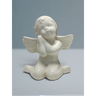 Tom's Florist Smyrna - A charming cherub figurine with delicate wings and a sweet, classic design perfect for adding a soft elegant touch to any space or display. 

It’s graceful design makes it a thoughtful addition to any sympathy gift collection, floral arrangement or home display

• Figurine measures 6.5” about the size of a large smartphone 
• The Cherub shown in photo three is placed in our large dish garden measuring about 15 inches in length


Please note: The plant shown with the cherub is pictured for display inspiration and is available separately. The cherub is sold on its own.