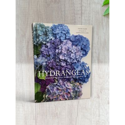 Tom's Florist Smyrna - Learn about all of the different kinds of hydrangeas with this book! Filled with stunning images of many hydrangea varieties, this makes for a beautiful coffee table book that can give you inspiration for your next landscaping project or table arrangement.