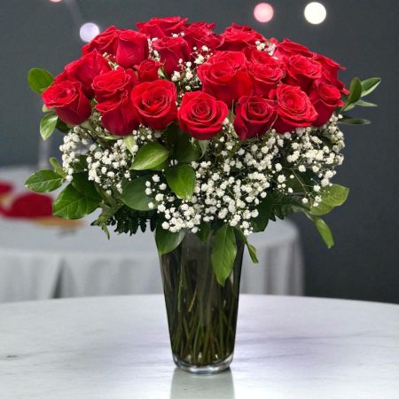 Tom's Florist Smyrna - Our luxurious long stem red roses are the ultimate surprise to say “I love you.”