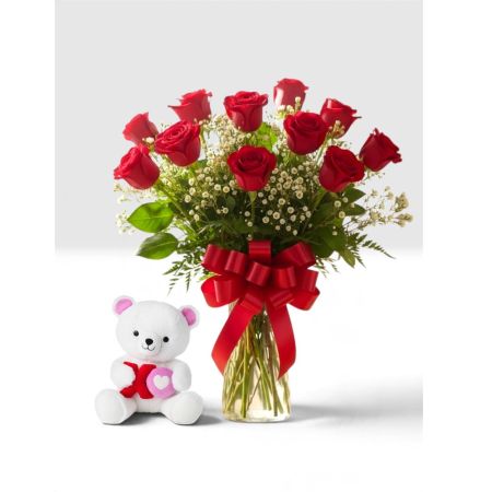 Tom's Florist Smyrna - A dozen beautiful red roses paired with an adorable petite white bear for the sweetest touch. Simple, cute, and full of love — because sometimes the little things mean the most