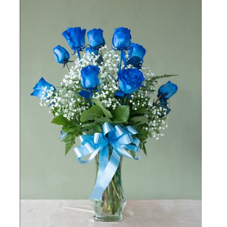 Conroy's Flowers El Cajon El Cajon - Surprise and delight your special someone with our Premium Long-Stem Blue Roses – an elegant and unique gesture for the one you trust, the one you can turn to, and the one you love with all your heart. Carefully selected for their enchanting blue hue, these premium long-stem roses are a symbol of mystery and fascination. Expertly arranged by our skilled florists and presented in a classic vase, our Premium Long-Stem Blue Roses make for a stunning expression of love and admiration. With our same-day flower delivery, you can promptly convey your deepest emotions, making the moment even more memorable with the captivating beauty of these exquisite blue roses.