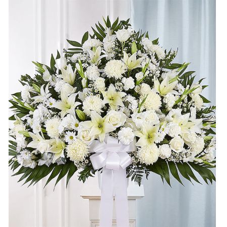 Conroy's Flowers El Cajon El Cajon - Symbolizing peace, serenity and purity, white flowers can help comfort those grieving the loss of someone they loved dearly. Our majestic standing basket arrangement in angelic white is an impressive tribute to their memory. Artistically designed by expert florists with an abundance of pristine white blooms, it is a heartfelt expression of your deepest sympathies.<br/><br/>