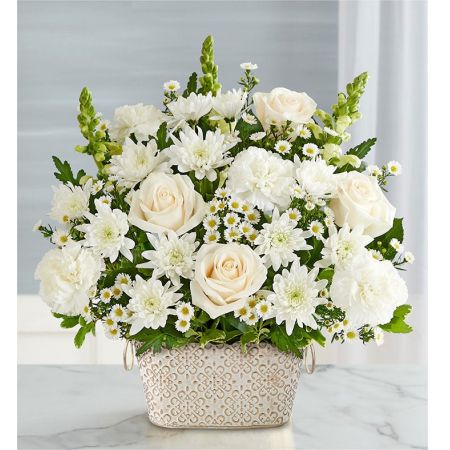 Conroy's Flowers El Cajon El Cajon - Celebrate the life of a loved one with "Loving Remembrance™ All White." This beautiful floral tribute features a mix of all-white blooms, symbolizing enduring love. Designed in our Remembrance Cachepot, featuring an embossed pattern and finished with a gold brushed ivory surface, this arrangement serves as a heartfelt expression. With our same-day flower delivery, you can promptly share this meaningful tribute with those who are mourning. "Loving Remembrance™ All White" is a touching and elegant arrangement that brings solace and warmth during challenging moments, offering comfort and support.






