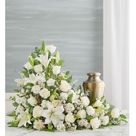Conroy's Flowers El Cajon El Cajon - Our all-white arrangement sends a heartfelt message of hope to those coping with loss. Handcrafted in an elegant asymmetrical design, it’s a beautiful tribute to honor the life of someone very special.