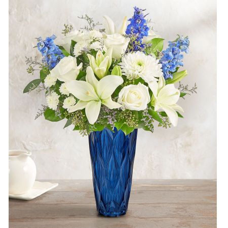 Conroy's Flowers El Cajon El Cajon - A peaceful gesture in times of sadness helps the memories of a loved one live on. Our soothing blue and white arrangement is loosely gathered with lush greenery in our graceful Blue Harmony vase, creating an elegant tribute when they need it most.