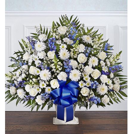 Conroy's Flowers El Cajon El Cajon - Offer the peace and tranquility that comes from classic blue and white flowers. Our elegant floor basket arrangement, handcrafted by our caring florists with pristine white and blue blooms, is a tasteful gesture perfectly suited for the funeral home or memorial services.<br/><br/>