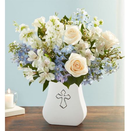 Conroy's Flowers El Cajon El Cajon - One thoughtful gesture can bring peace and comfort when it’s needed most. Our elegant arrangement of soft blues and whites is hand-arranged in our white, ceramic Sacred Blessings Vase, featuring a silver embossed cross. It’s a beautiful reminder that hope and love live on in our memories.