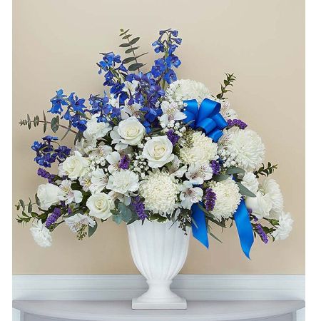 Conroy's Flowers El Cajon El Cajon - EXCLUSIVE The greatest tribute is to remember a lost loved one as they lived. To comfort friends and loved ones of the departed, our florists hand-arrange fresh roses, carnations, delphinium and more in shades of blue and white in a graceful keepsake pedestal vase. Elegantly crafted with satin finish and delicate fluting, a timeless vase that can be used to hold flowers or on its own as an objet d’art.