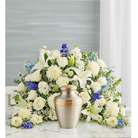 Conroy's Flowers El Cajon El Cajon - Express your heartfelt condolences with a beautiful floral tribute. Our blue and white crescent shaped design is handcrafted from a soothing cascade of blooms to honor a loved one in a meaningful way.
