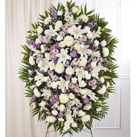 Conroy's Flowers El Cajon El Cajon - With its calming lavender hues and pristine white blossoms, the Lavender And White Funeral Standing Spray serves as a poignant expression of sympathy and remembrance. The meticulous craftsmanship of our expert local florists ensures a lush and full presentation, creating an arrangement that captures the essence of grace and tranquility. Each bloom is a symbol of the love and respect you wish to convey during moments of grief, providing a meaningful and heartfelt tribute to honor the life of a cherished individual.
