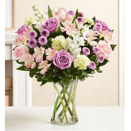 Conroy's Flowers El Cajon El Cajon - Express your condolences with the "Thoughtful Sentiment™ Bouquet." Sometimes, a thoughtful sentiment can help convey your feelings when words alone aren't enough. This soothing arrangement is crafted with a loose gathering of pastel blooms, complete with lush touches of greenery. Hand-designed inside a clear glass vase, it's a gesture that delivers your love, support, and care in the most heartfelt way. With our same-day flower delivery, you can promptly share this thoughtful and comforting arrangement with those who are mourning. "Thoughtful Sentiment™ Bouquet" is a beautiful and meaningful expression that brings solace and warmth during challenging moments.
