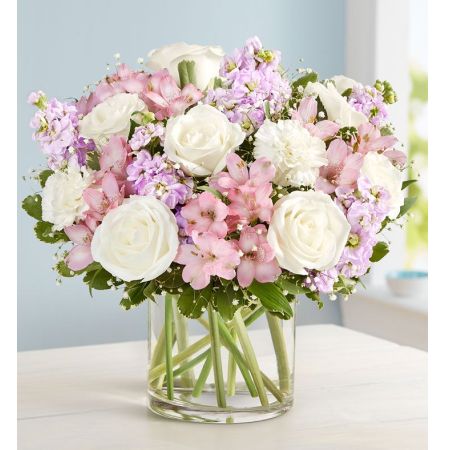 Conroy's Flowers El Cajon El Cajon - Express your sympathy with the "Loving Sentiments™ Pink & White." This graceful arrangement in shades of blush pink and creamy white is a touching expression of sympathy for someone you care about. Cascading blooms are hand-gathered with lush greenery inside a clear cylinder vase, creating a beautiful tribute to the memory of a loved one while providing comfort and support during a difficult time. With our same-day flower delivery, you can promptly share this thoughtful and comforting arrangement with those who are mourning. "Loving Sentiments™ Pink & White" is a heartfelt and elegant expression that brings solace and warmth during challenging moments.