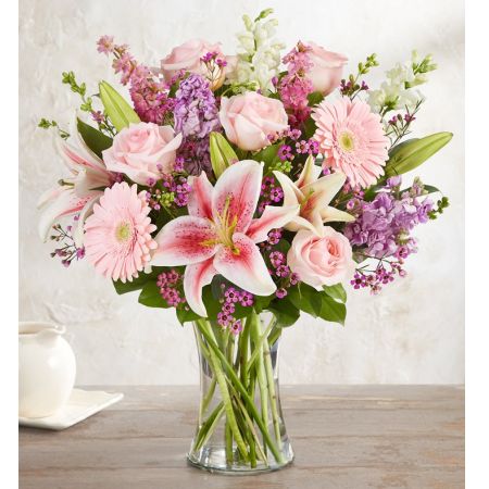Conroy's Flowers El Cajon El Cajon - Honor a loving memory with the "In Loving Memory™ Bouquet for Sympathy." This beautiful garden-inspired bouquet is gathered with a mix of pink and purple blooms, creating a warm and heartfelt expression of your deepest condolences.With our same-day flower delivery, you can promptly share this beautiful and comforting arrangement with those who are mourning. The "In Loving Memory™ Bouquet for Sympathy" is a thoughtful and meaningful way to convey sympathy, bringing solace and warmth during difficult times.





