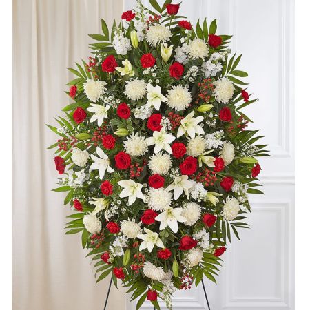 Conroy's Flowers El Cajon El Cajon - In times of loss, expressing support and care is crucial, and our Red & White Sympathy Standing Spray does just that. This classic standing spray arrangement is elegantly crafted with radiant red roses and peaceful white blooms. The combination of red and white symbolizes a warm embrace and kind words, providing a memorable gesture to offer comfort during difficult times. This arrangement serves as a beautiful tribute to honor the memory of a loved one and convey heartfelt condolences.
