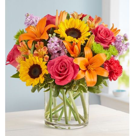 Conroy's Flowers El Cajon El Cajon - Express your warm condolences beautifully with "Floral Embrace™ for Sympathy." Like a comforting embrace, this vibrant bouquet features a gathering of yellow and orange blooms with hints of pink and purple. It is a thoughtful and heartfelt gesture of sympathy that will be long appreciated by those in mourning. With our same-day flower delivery, you can promptly extend your condolences and provide a source of comfort to those in need. "Floral Embrace™ for Sympathy" is a beautiful expression that conveys warmth and solace during difficult times.






