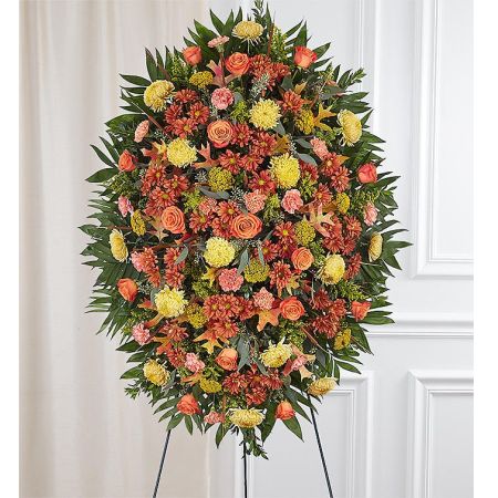 Conroy's Flowers El Cajon El Cajon - Express your condolences with the beauty of fall through our Sympathy Standing Spray - Fall. This arrangement is thoughtfully crafted by skilled local florists, ensuring a meaningful tribute to honor the memory of your loved one. The rich autumn colors, including warm oranges, peaches, and whites, create a striking display that symbolizes the joy and happiness your loved one brought into the lives of those around them. It serves as a touching and seasonal expression of sympathy, bringing comfort and solace to those mourning the loss.






