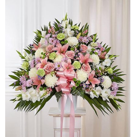 Conroy's Flowers El Cajon El Cajon - When someone we care for deeply passes away, it’s comforting to remember the joy and happiness they brought to those around them. Filled with lush blooms in soft, light pastel shades, our traditional standing basket arrangement is handcrafted by expert florists, creating a touching tribute to celebrate the life of a loved one who will never be forgotten.