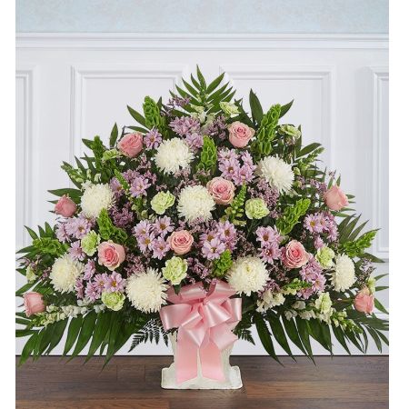 Conroy's Flowers El Cajon El Cajon - After the loss of a loved one, a heartfelt sentiment goes a long way to show how much you care. Our elegant floor basket arrangement is crafted with soft, soothing pastel blooms, creating a touching tribute to a special loved one, while offering comfort and support when words alone aren’t enough.
