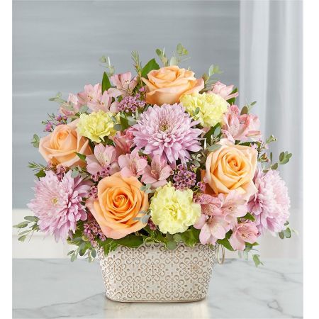 Conroy's Flowers El Cajon El Cajon - Celebrate the life of a loved one with our "Loving Remembrance Multicolor Pastels." This beautiful floral tribute features a mix of blooms in soothing pastel shades, symbolizing enduring love. The arrangement is thoughtfully designed in our Remembrance Cachepot, featuring an embossed pattern and finished with a gold brushed ivory surface. With our same-day flower delivery, you can promptly honor the memory of a cherished individual and offer comfort to those who are grieving. The "Loving Remembrance Multicolor Pastels" is a touching and elegant expression that brings solace and beauty to a somber occasion.





