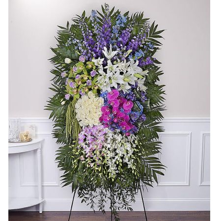 Conroy's Flowers El Cajon El Cajon - Celebrate the vibrant and full life of your loved one with our Heavenly Garden™ Standing Spray. This grand and artfully crafted standing spray features an abundance of heavenly blooms, showcasing a variety of floral varieties and textures. The arrangement is designed to represent the lasting impression and love that your departed one made on everyone who had the privilege of knowing them. With lush, trailing greens at its base, this standing spray serves as a beautiful tribute to a life lived to the fullest.





