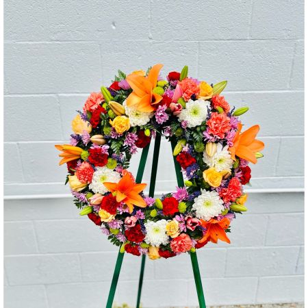 Conroy's Flowers El Cajon El Cajon - Celebrate the enduring spirit of a loved one with the radiant beauty of "Serene Blessings™ Standing Wreath - Bright." Expertly handcrafted by our local florists, this bright standing wreath features a vibrant mix of blooms, creating a lush and full presentation. The colorful arrangement serves as an exquisite tribute, bringing comfort and solace to those attending the funeral or memorial service. Each petal and hue symbolizes cherished memories, honoring the circle of eternal life with a thoughtful expression of love and remembrance.





