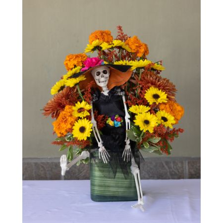 Conroy's Flowers El Cajon El Cajon - Honor your love ones with this gorgeous arrangement of marigolds and seasonal blooms to add that unique touch to your ofrenda. 
figurine color and designs may vary 