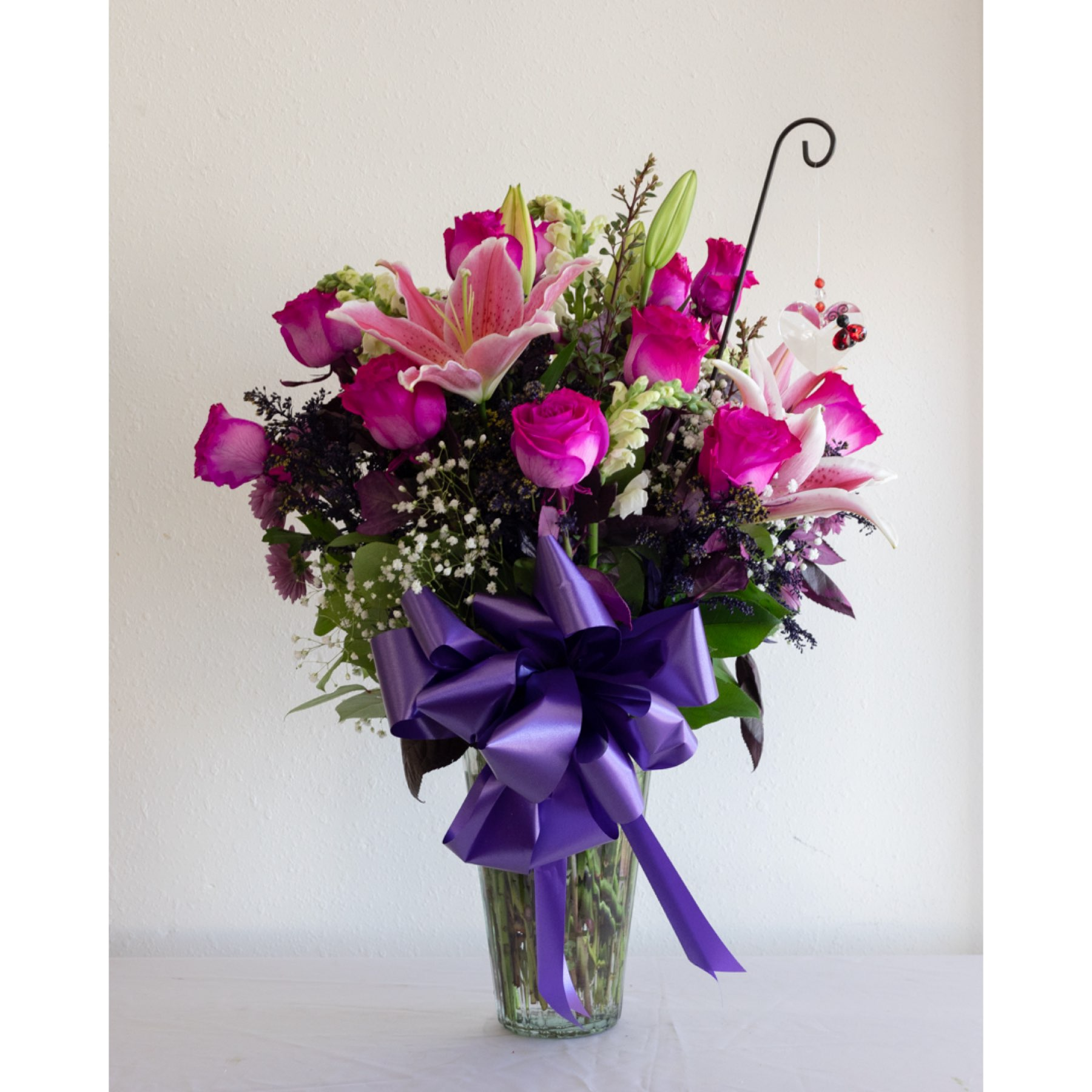 Conroy's Flowers El Cajon El Cajon - "Everlasting Love" is a grand gesture that speaks volumes. Delicate and caring tones of pink, white, and purple blooms are meticulously arranged in a tall vase, creating a stunning display of enduring beauty.With our same-day flower delivery, you can make this grand expression of love promptly, bringing the soft and timeless beauty of "Everlasting Love" to your special moments. Convey your emotions with the grace and elegance of this carefully crafted floral arrangement.