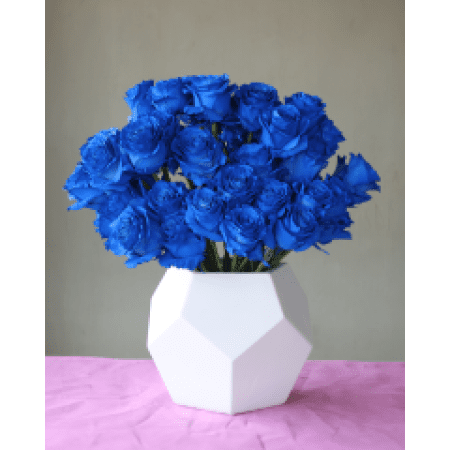 Conroy's Flowers El Cajon El Cajon - One of our most remarkable designs to date, "Sapphire Dreams" features extremely rare royal blue roses. The asymmetrical blue cloud floats atop a tall white ceramic geometric vase.