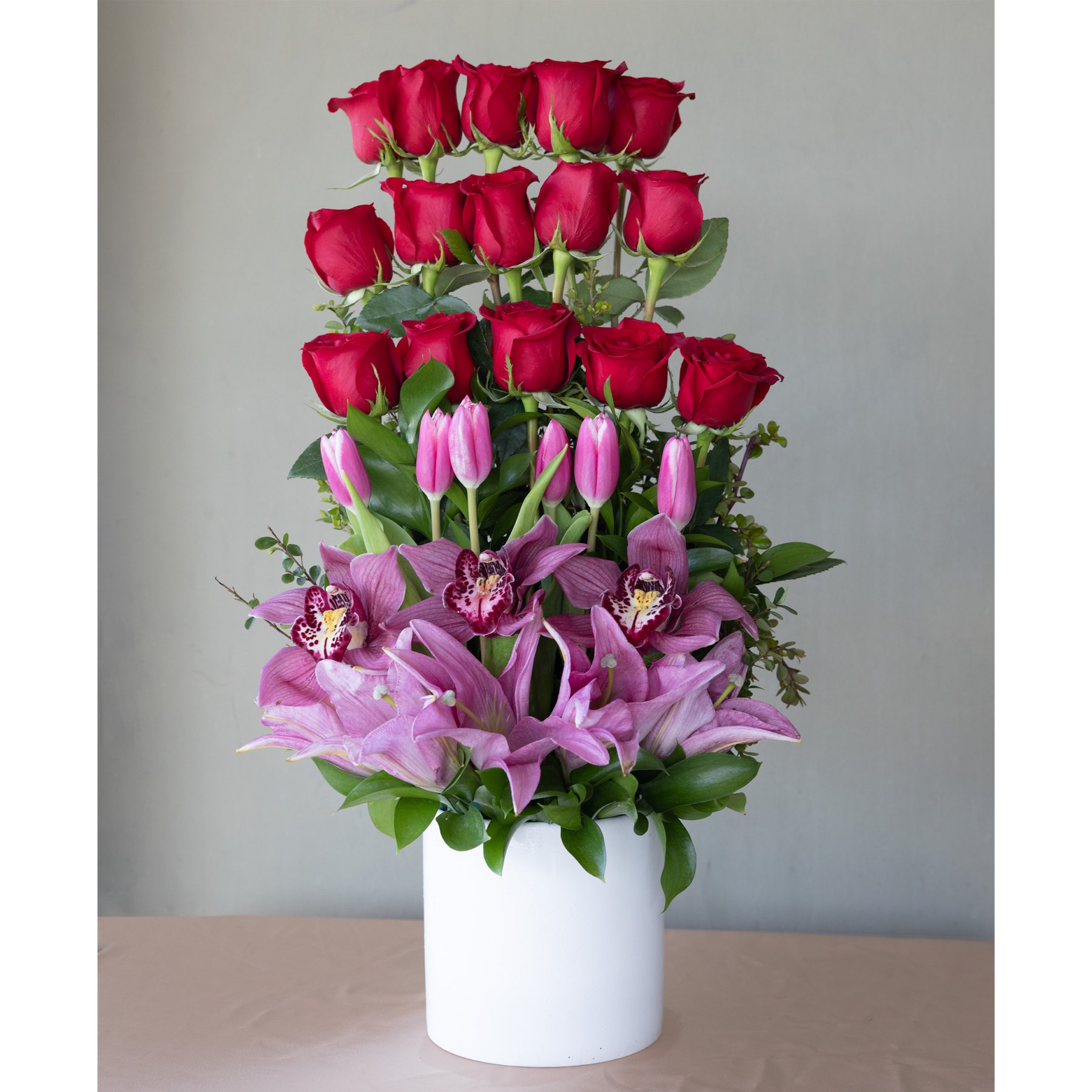 Conroy's Flowers El Cajon El Cajon - Elevate your expressions of devotion with "Grand Devotion," a striking floral composition that exudes richness, radiance, and inviting feelings. This vibrant design is a perfect fit for any personality and an ideal choice for special occasions when you want to convey appreciation and heartfelt emotion. The freshest blooms in shades of red and pink combine to create a one-of-a-kind floral gift that captivates the senses. With our same-day flower delivery, you can ensure that this grand and expressive arrangement reaches its destination promptly, making it a memorable and heartfelt surprise for your special occasion. Embrace the beauty and uniqueness of "Grand Devotion" to make a lasting impression.
