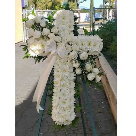 Conroy's Flowers El Cajon El Cajon - Honor a lifetime of faithful devotion with our beautiful standing cross arrangement. Our expert florists handcraft each of these impressive displays with a bed of white mums in the shape of a cross, and accent with a cascade of crisp white roses. It is a beautiful way to offer peace and comfort during a difficult time.