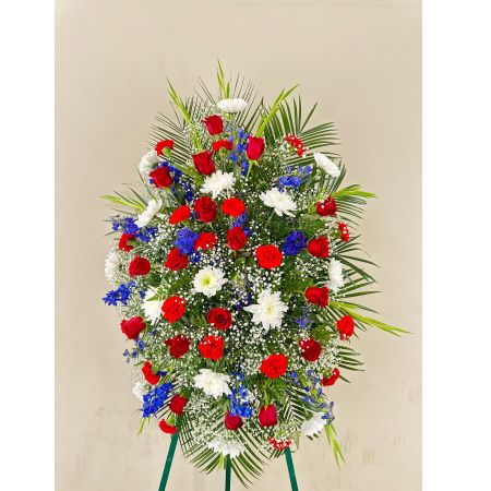 Conroy's Flowers El Cajon El Cajon - In honor of those who served their country with honor and pride, our Red, White & Blue Sympathy Standing Spray stands as a poignant remembrance. Meticulously handcrafted by our expert florists, this patriotic standing spray is dedicated to honoring the memory of a brave veteran who has passed away. Filled with fresh blooms in vibrant red, pure white, and deep blue, the arrangement offers a lush and full presentation—a proud and fitting final tribute to commemorate the service and sacrifice of the departed veteran.