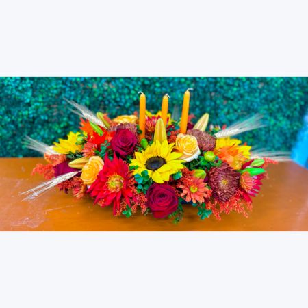 Conroy's Flowers El Cajon El Cajon - traditional Table centerpiece creates the perfect atmosphere for the holidays! 
Beautiful seasonal blooms carefully arranged together to bring this jolly piece to life 