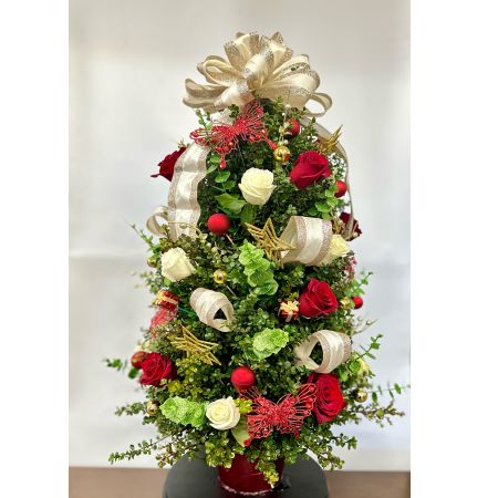 Conroy's Flowers El Cajon El Cajon - Bring out the most out of the holiday season with this captivating Christmas tree! Sitting at 3ft tall with the best of our blooms and seasonal decor. This piece is one to be remembered! 