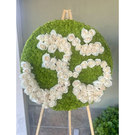 Conroy's Flowers El Cajon El Cajon - Our Om Funeral Wreath is a deeply symbolic tribute, crafted with reverence to honor the spiritual journey of your loved one. Featuring fresh, premium blooms arranged meticulously around the sacred Om symbol, this wreath embodies peace, serenity, and the eternal connection between life and the divine. Perfect for Desi and Hindu funeral services, this elegant wreath serves as a beautiful expression of respect and love.

 Please note that this item requires a 48-hour notice to ensure its creation with the utmost care and attention.