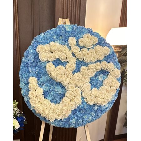 Conroy's Flowers El Cajon El Cajon - Our Om Funeral Wreath is a deeply symbolic tribute, crafted with reverence to honor the spiritual journey of your loved one. Featuring fresh, premium blooms arranged meticulously around the sacred Om symbol, this wreath embodies peace, serenity, and the eternal connection between life and the divine. Perfect for Desi and Hindu funeral services, this elegant wreath serves as a beautiful expression of respect and love.


 Please note that this item requires a 48-hour notice to ensure its creation with the utmost care and attention.
