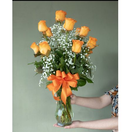 Conroy's Flowers El Cajon El Cajon - Surprise and delight the one you trust, turn to and love with all your heart with our Premium Long-Stem Orange Roses – an elegant and vibrant surprise. These premium long-stem orange roses are beautifully arranged to convey warmth and affection. Lush greenery complements the vibrant orange blooms, creating a stunning and sophisticated display. With our same-day flower delivery, you can ensure that this exquisite arrangement arrives promptly, making it a perfect surprise for any occasion or a gesture to express your heartfelt emotions. Embrace the unique beauty of orange roses and let this elegant bouquet convey your sentiments in a truly extraordinary and romantic way.
