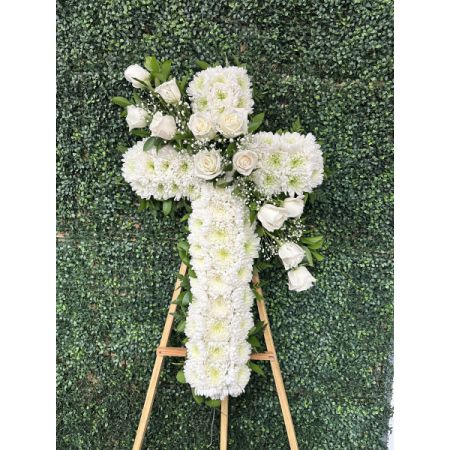Conroy's Flowers El Cajon El Cajon - Honor a lifetime of faithful devotion with our beautiful standing cross arrangement. Our expert florists handcraft each of these impressive displays with a bed of white mums in the shape of a cross, and accent with a cascade of crisp white roses. It is a beautiful way to offer peace and comfort during a difficult time.


