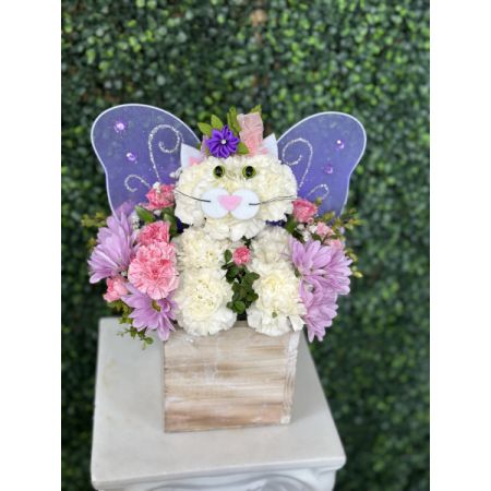 Conroy's Flowers El Cajon El Cajon - A magical day is just a fairy cat away! Our fantastical feline is artistically crafted with a mix of white, pink and lavender blooms. Featuring a sweet flower crown and glittering, rhinestone-adorned wings, this unique and enchanting 3D creation brings whimsical fun to everyone.