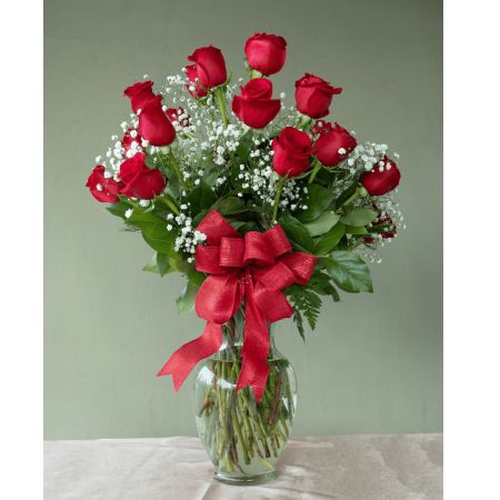 Conroy's Flowers El Cajon El Cajon - Surprise your special someone with our Premium Long-Stem Red Roses – an elegant gesture for the one you trust, the one you can turn to, and the one you love with all your heart. Expertly arranged by our skilled florists, these premium long-stem red roses come with lush greenery inside a classic glass vase.With our same-day flower delivery, you can convey your love and admiration promptly. Make a lasting impression and express your deepest emotions with the timeless beauty of premium long-stem red roses.