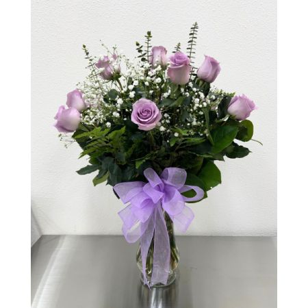 Conroy's Flowers El Cajon El Cajon - Surprise your special someone with our Premium Long-Stem Lavender Roses – an elegant and enchanting gesture for the one you trust, the one you can turn to, and the one you love with all your heart. Carefully selected for their deep and rich hue, these premium long-stem roses are a symbol of sophistication and adoration. Expertly arranged by our skilled florists and presented in a classic vase, our Premium Long-Stem Lavender Roses make for a stunning expression of love and appreciation. With our same-day flower delivery, you can promptly convey your deepest emotions, making the moment even more memorable with the allure of these exquisite roses.